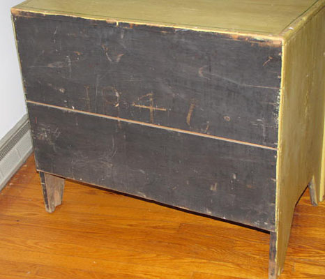 Great early painted chest with two drawers, hand carved wooden pulls, square nail construction, has unusual drawer slides that go into the back boards.